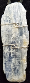 Blue kyanite wire wrapped untumbled raw gemstone necklace on cord 