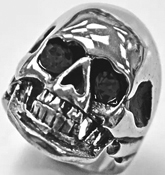 Stainless steel skull head ring with red eyes
