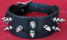 Staggered 1/2 inch chrome spikes genuine leather buckling wristband by Ape Leather