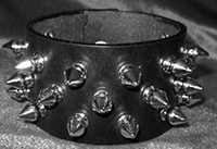 3 row staggered 1/2 inch chrome spikes 1 3/4 inch wide genuine leather snap wristband by Ape Leather