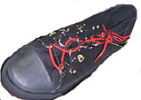 Pleaser black canvas baseball bootie with rubber soles, black and red d-ring lacing