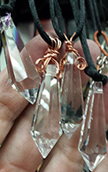 Copper Wire wrapped clear crystal 1 1/2 inch point on black cord