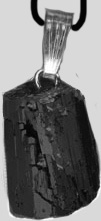 Black tourmaline untumbled pendant necklace on black cord