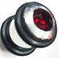 3/8 inch stainless steel plug with siam red swarovski crystal on one end and two rubber o-rings
