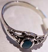 Nirvana sterling silver ring with inlaid turquoise stone