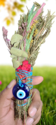 Rosemary sage with flowers and evil eye smudge stick