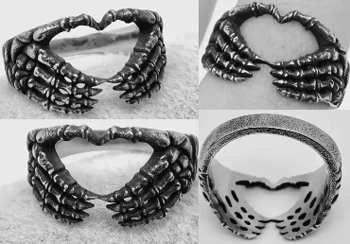 Mio Queena heart skull hand bone stainless steel ring