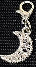 Silver crescent moon charm on cord